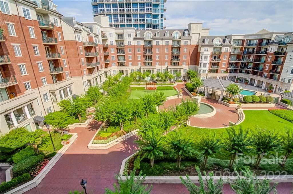 300 West 5th Street, Unit 339 Charlotte, NC 28202 - Photo 3 of 40 a view of a swimming pool and a garden