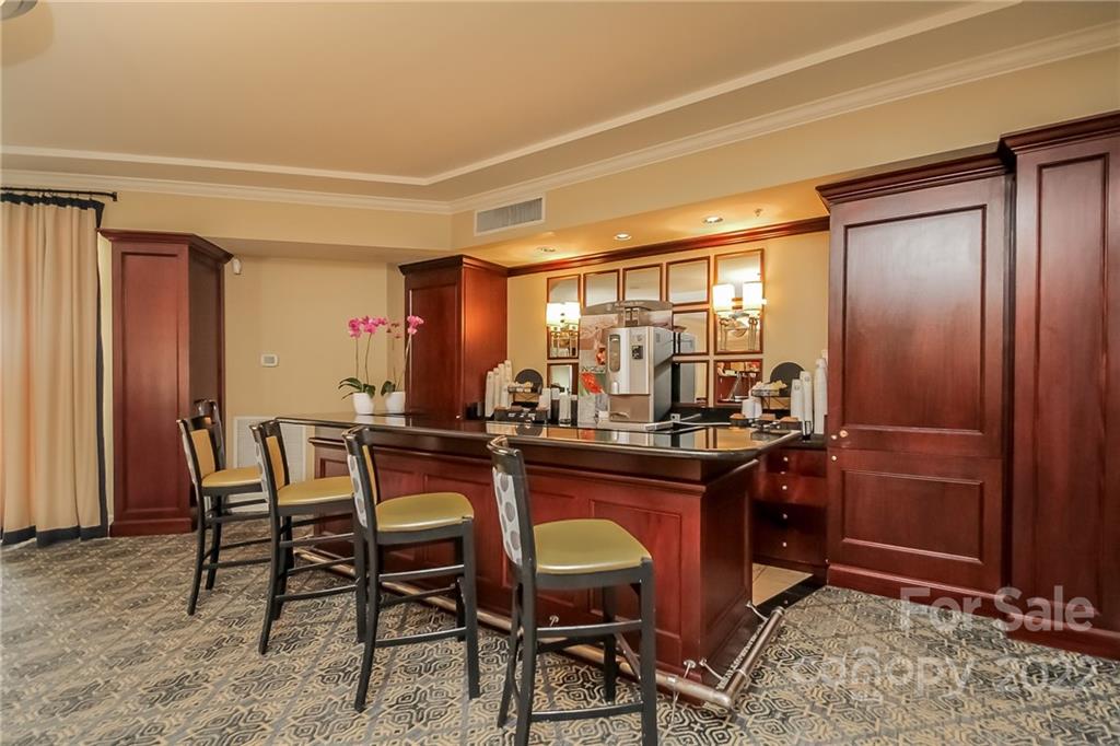 300 West 5th Street, Unit 339 Charlotte, NC 28202 - Photo 36 of 40 a view of a dining room with furniture