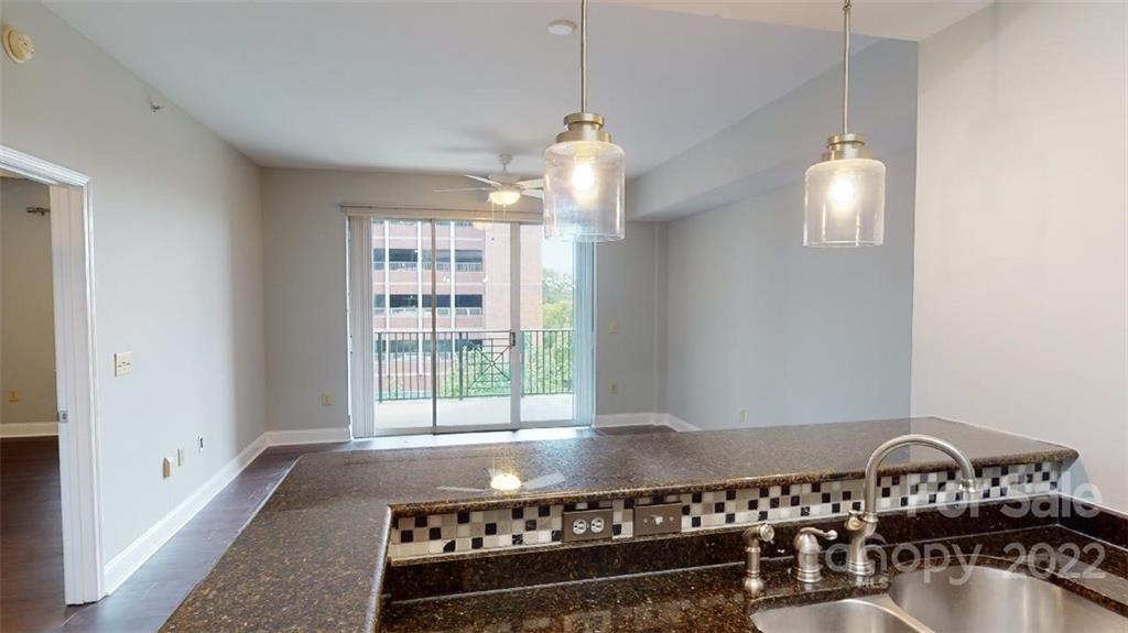 300 West 5th Street, Unit 339 Charlotte, NC 28202 - Photo 8 of 40 a very nice looking room with a window