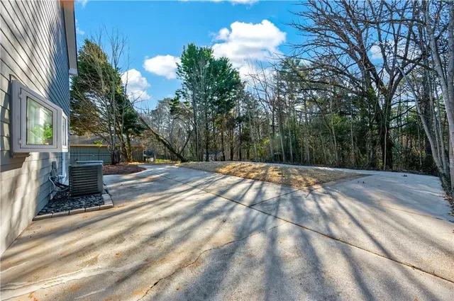 a view of backyard with tree