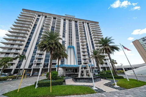 front view of a building with a yard