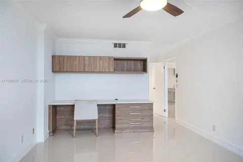 a view of kitchen with furniture and wooden floor