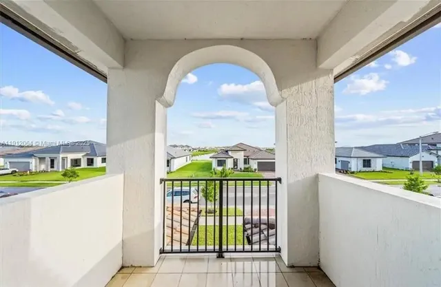 a view of a balcony with an outdoor space