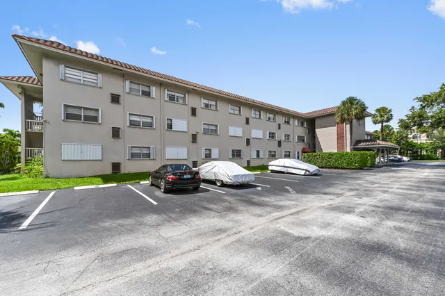 a view of a street with cars