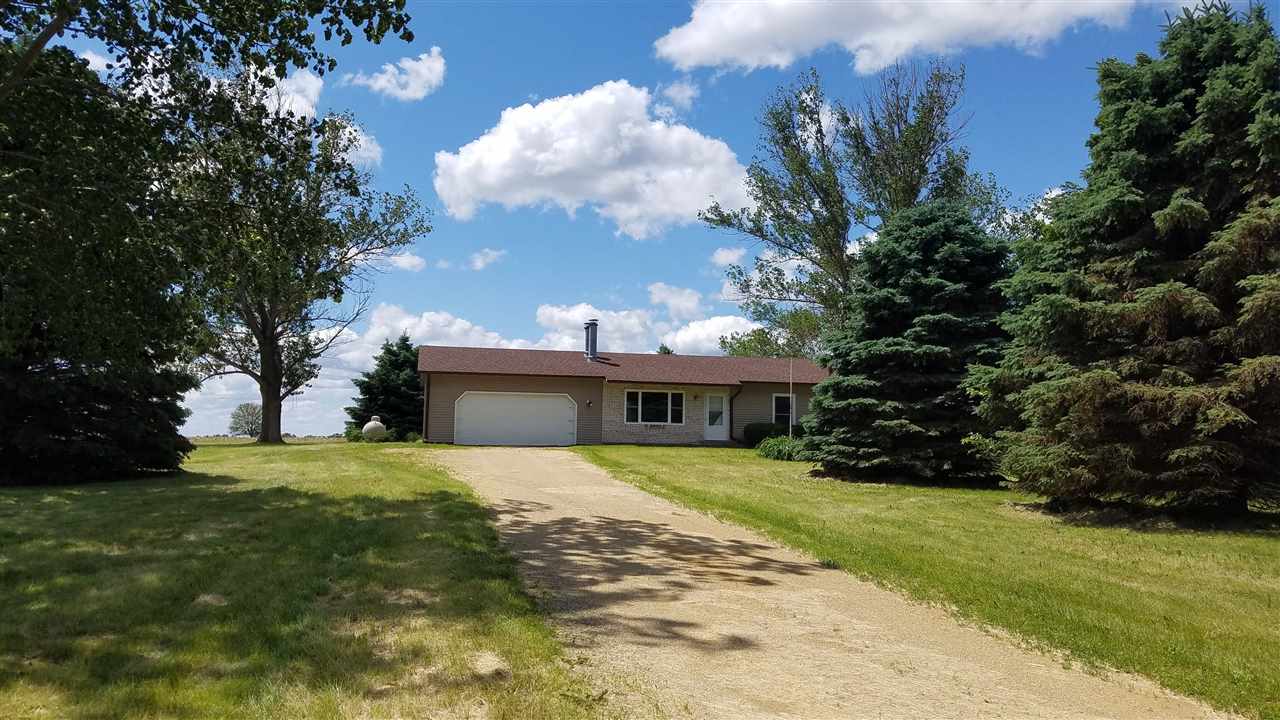 3065 East Stub Road Byron, IL 61010 - Photo 23 of 24 a view of house with outdoor space and garden