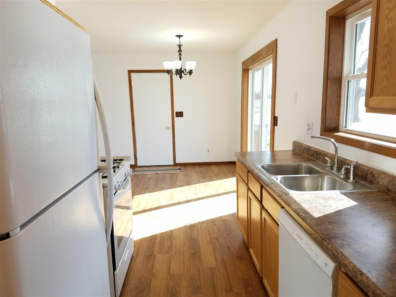 3065 East Stub Road Byron, IL 61010 - Photo 8 of 24 a bathroom with a tub a sink and a large window