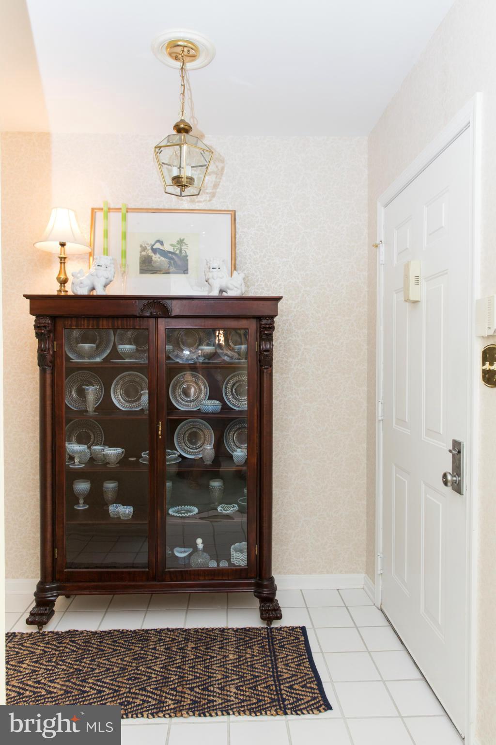 402 Kilree Road, Unit 101 Lutherville-Timonium, MD 21093 - Photo 22 of 23 Foyer with Coat Closet