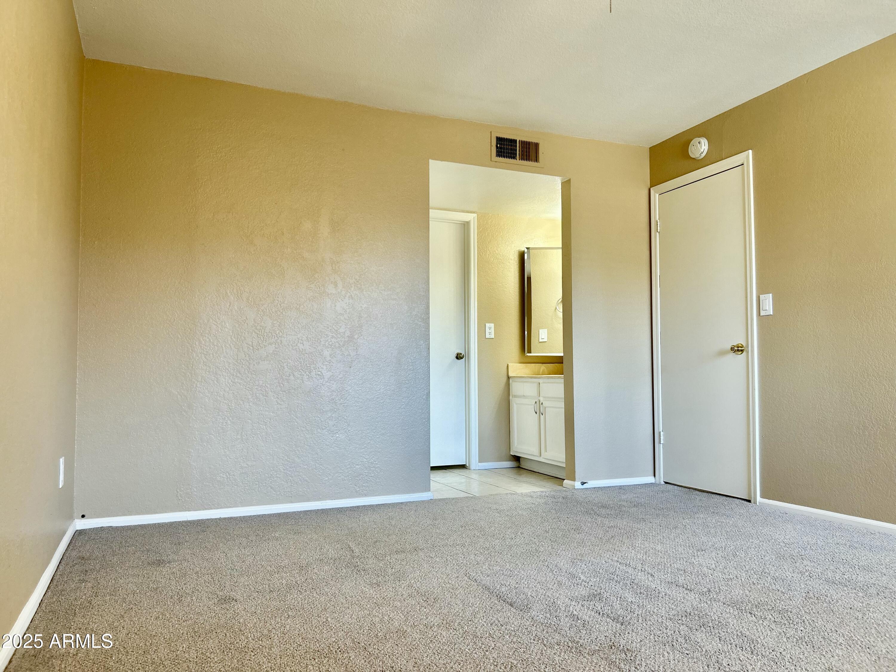 623 West Guadalupe Road, Unit 217 Mesa, AZ 85210 - Photo 9 of 12 a view of an empty room