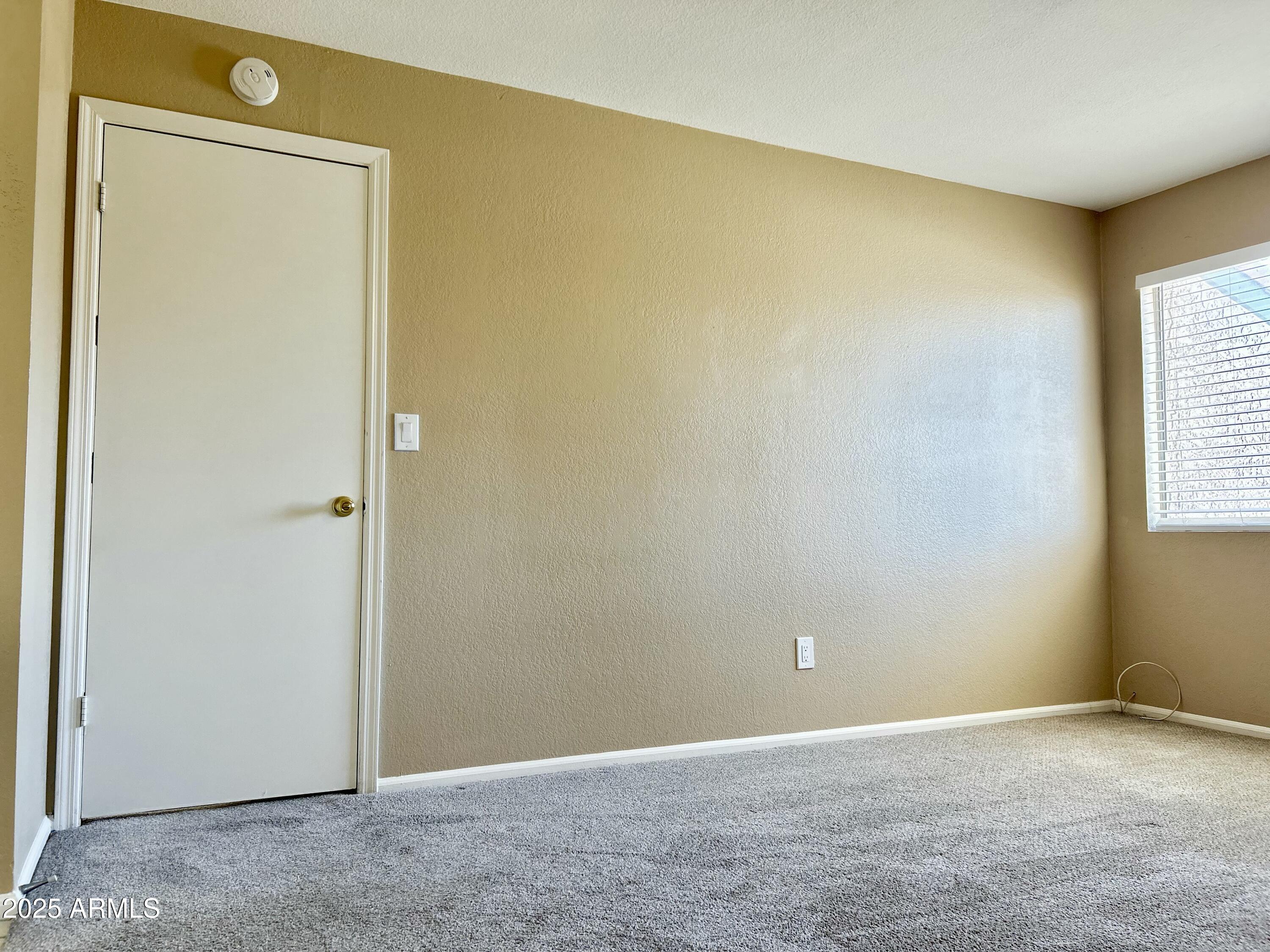 623 West Guadalupe Road, Unit 217 Mesa, AZ 85210 - Photo 10 of 12 a view of an empty room