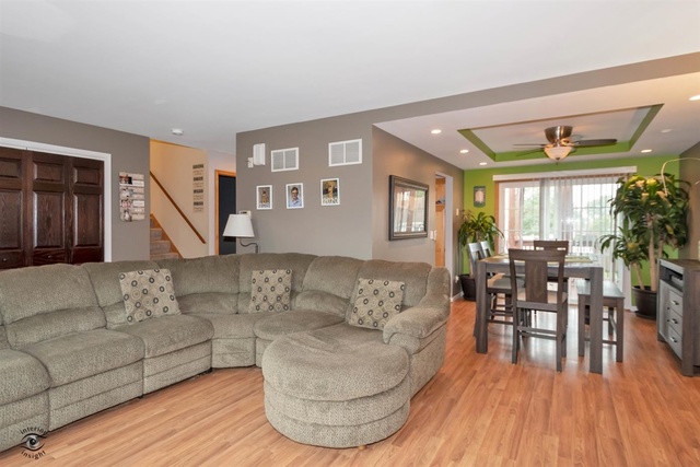784 Darsha Road New Lenox, IL 60451 - Photo 4 of 21 a living room with furniture and wooden floor