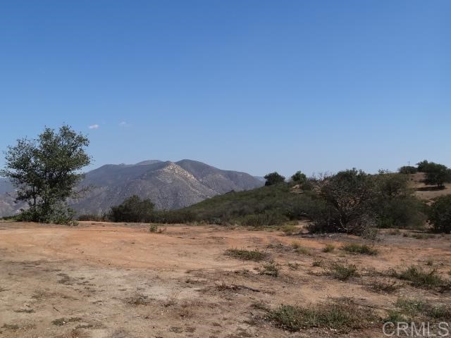 10 The Yellow Brick Road Valley Center, CA 92082 - Photo 1 of 1 a view of a dry yard with mountains in the background