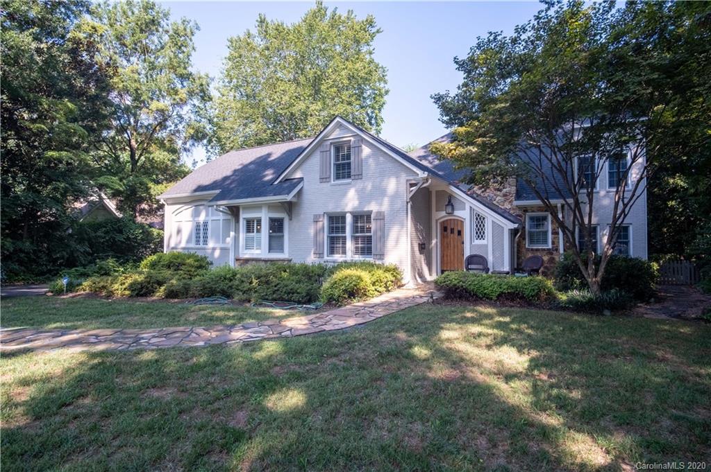 1844 Harris Road Charlotte, NC 28211 - Photo 1 of 29 a front view of a house with yard and green space