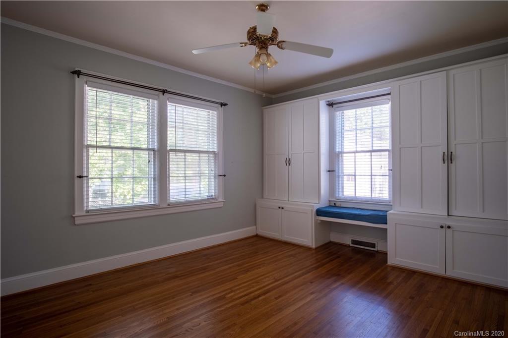 1844 Harris Road Charlotte, NC 28211 - Photo 20 of 29 a view of an empty room with wooden floor and a window