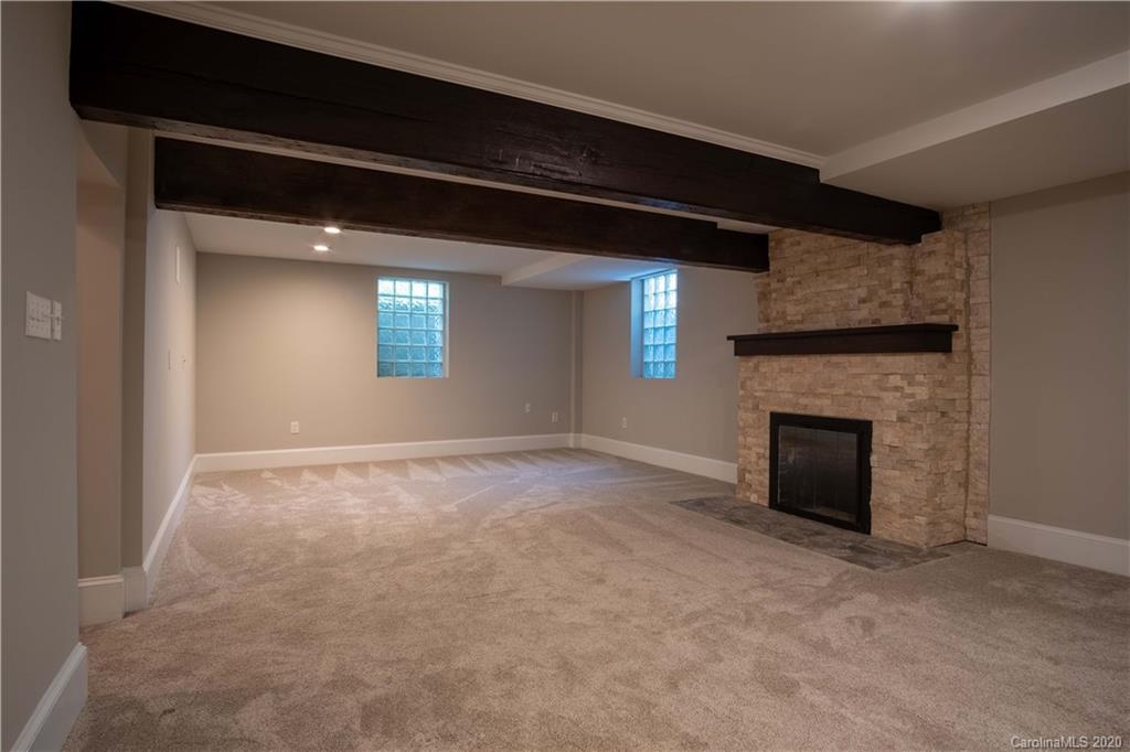 1844 Harris Road Charlotte, NC 28211 - Photo 23 of 29 a view of empty room with a fireplace