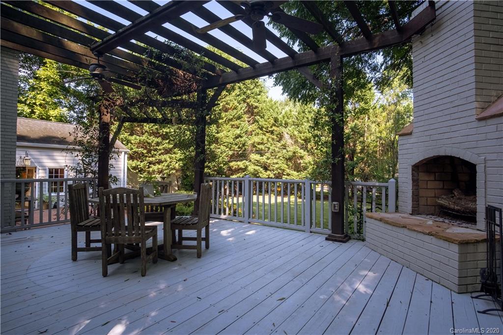1844 Harris Road Charlotte, NC 28211 - Photo 24 of 29 a view of a porch with furniture and a yard