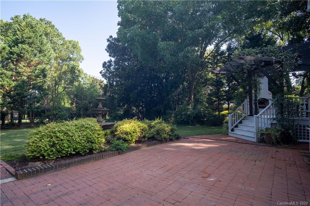 1844 Harris Road Charlotte, NC 28211 - Photo 25 of 29 a view of backyard with plants and trees