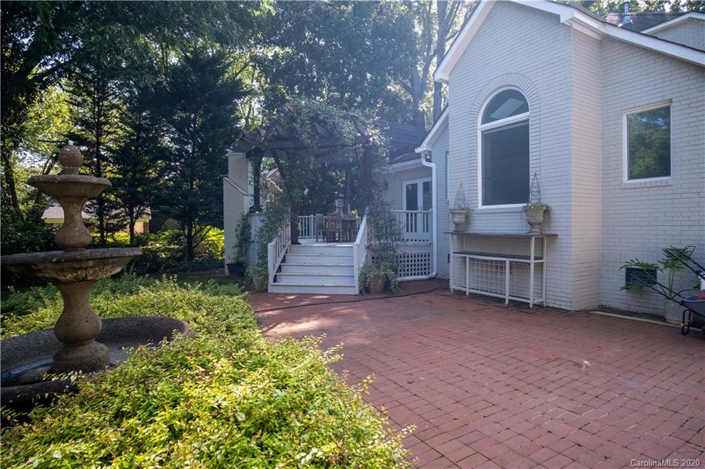 1844 Harris Road Charlotte, NC 28211 - Photo 27 of 29 a view of a house with backyard and sitting area