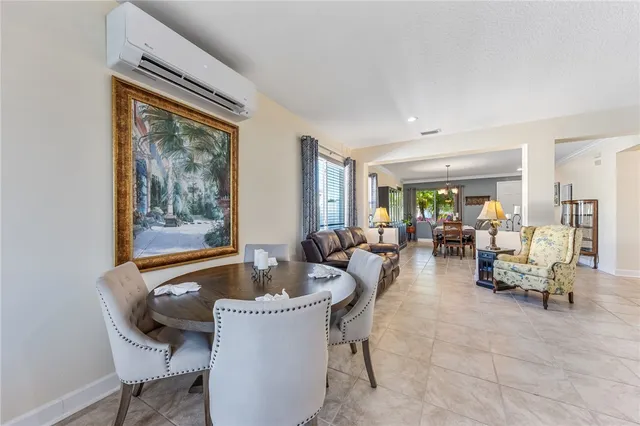 a view of a lake with houses in the back