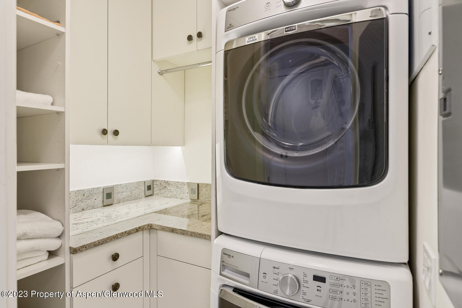 100 East Cooper Avenue, Unit 6 Aspen, CO 81611 - Photo 18 of 24 a utility room with sink dryer and washer