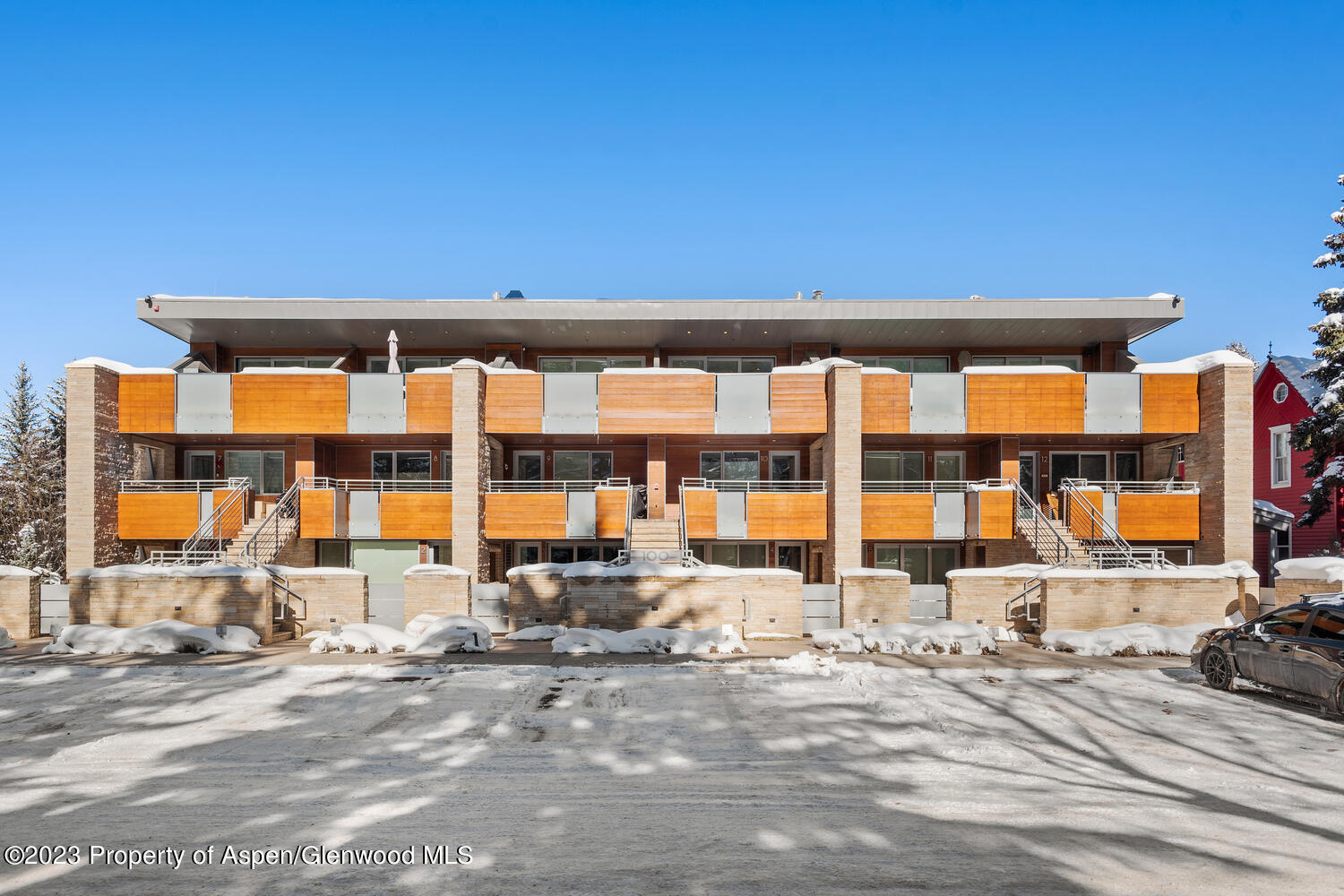 100 East Cooper Avenue, Unit 6 Aspen, CO 81611 - Photo 20 of 24 a front view of a building with a street
