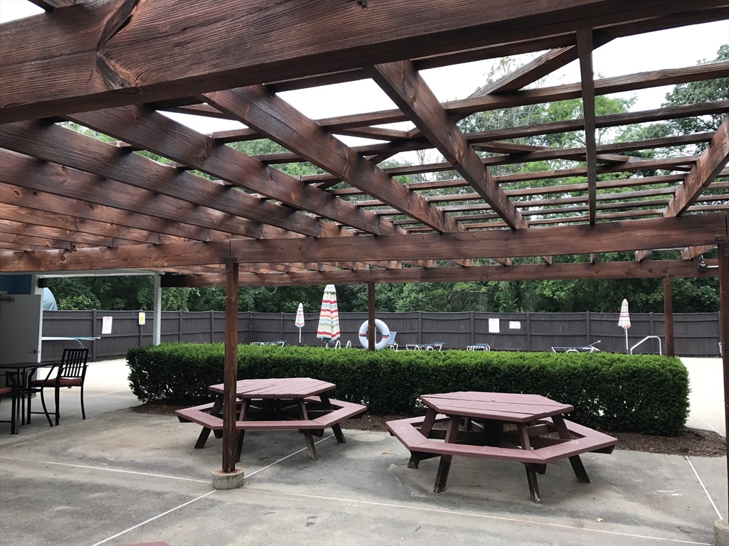 7 Beal's Cove Road, Unit 7A Hingham, MA 02043 - Photo 7 of 8 a outdoor space with patio lots of furniture