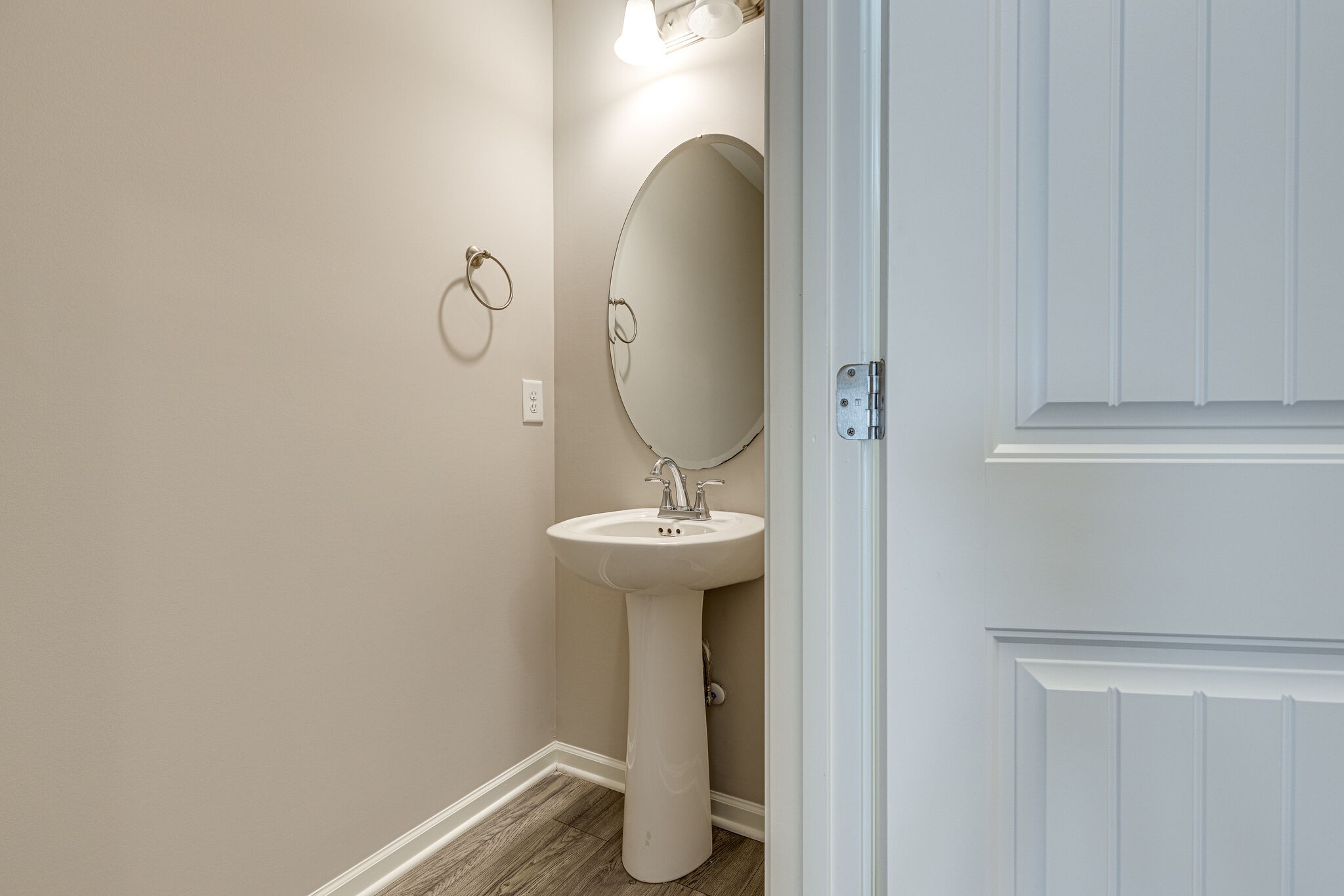 312 Mattie Ln Spring Hill Spring Hill, TN 37174 - Photo 18 of 37 a bathroom with a sink and mirror