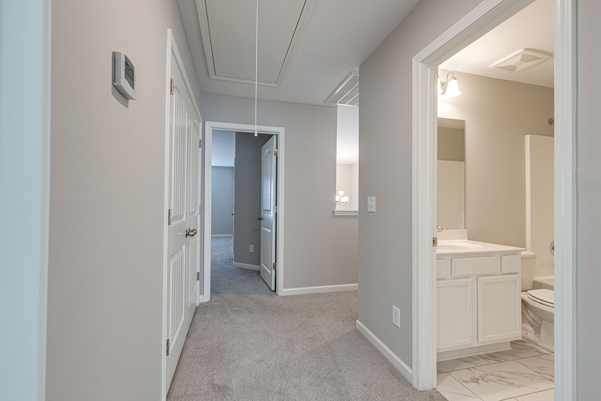 312 Mattie Ln Spring Hill Spring Hill, TN 37174 - Photo 29 of 37 a view of a bathroom from the hallway with toilet