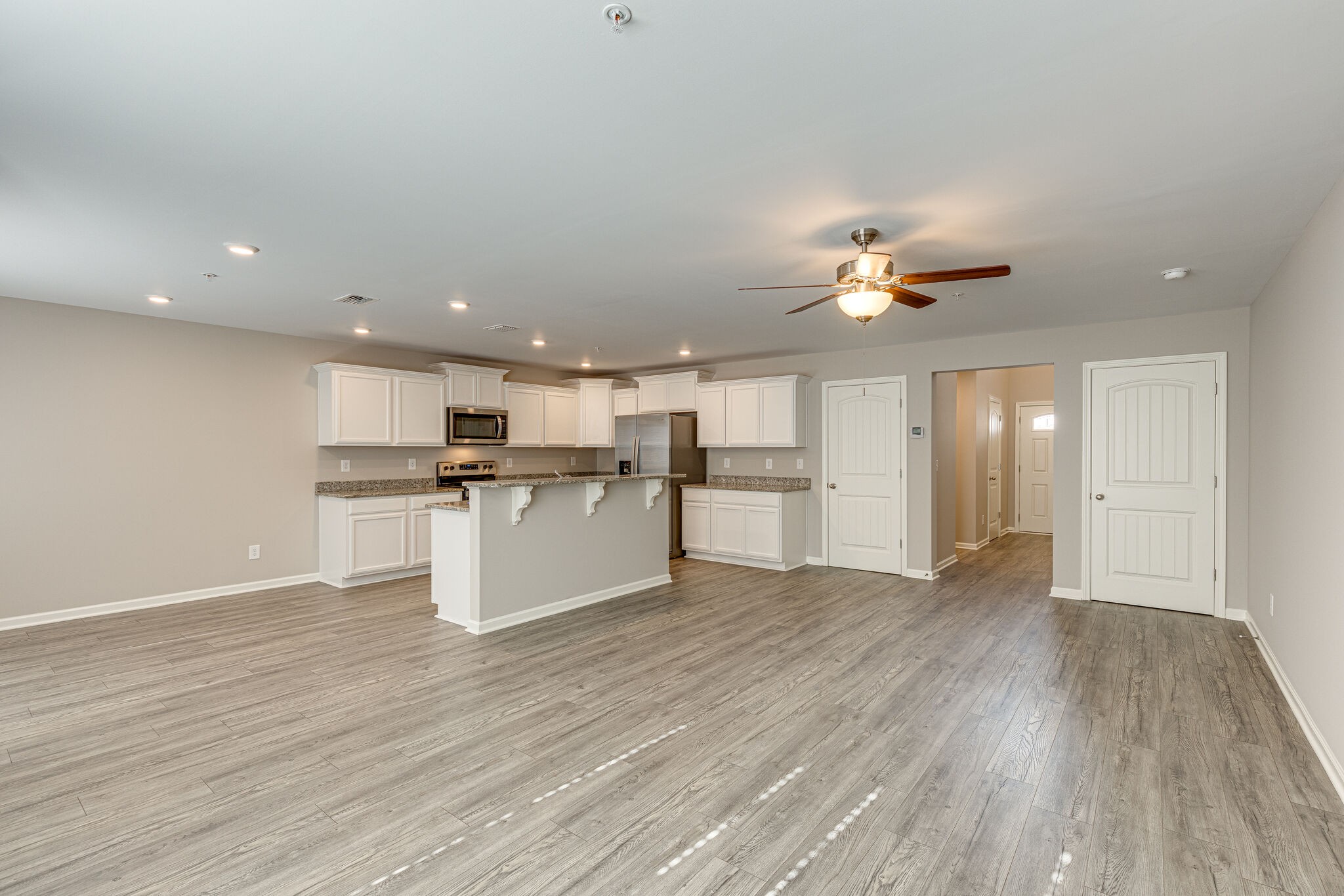 312 Mattie Ln Spring Hill Spring Hill, TN 37174 - Photo 7 of 37 a view of kitchen with cabinets and wooden floor