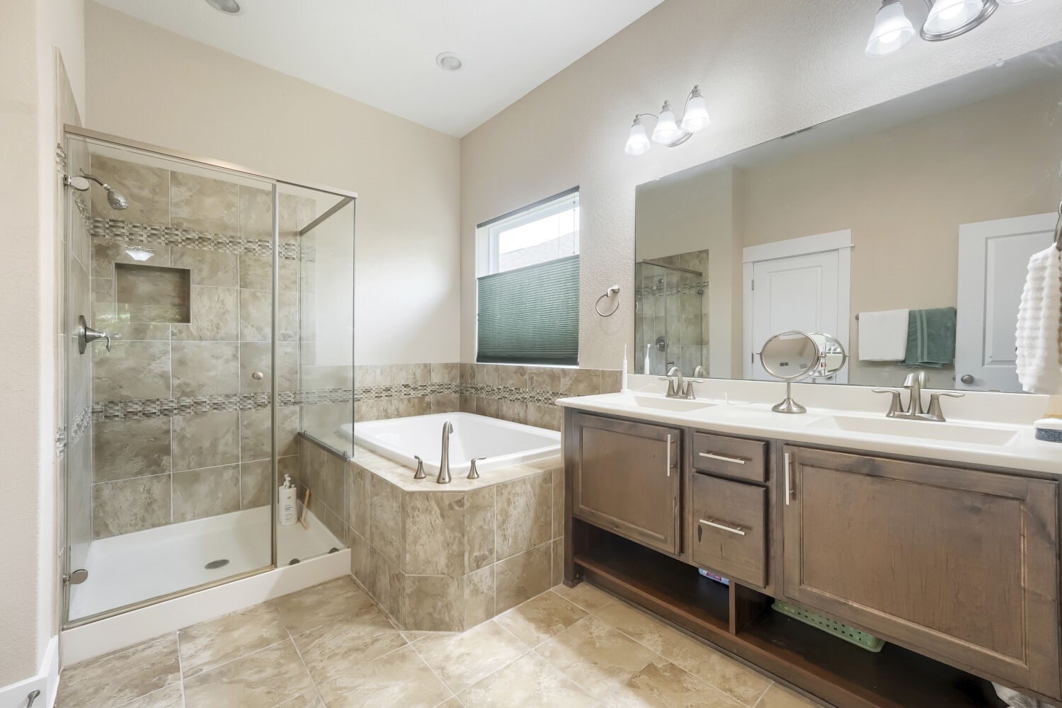 805 Waterfall Way Austin, TX 78753 - Photo 21 of 29 Primary Bathroom with oversized soaking tub extended Shower