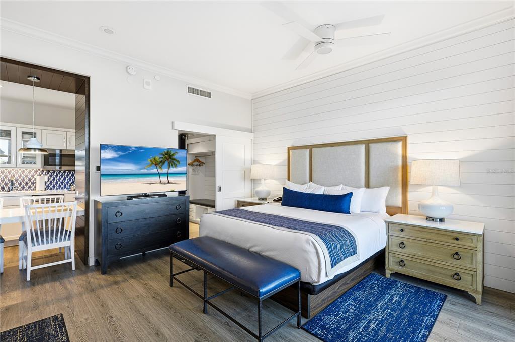 225 Sands Point Road, Unit 7101 Longboat Key, FL 34228 - Photo 16 of 44 a bedroom with a bed and a window