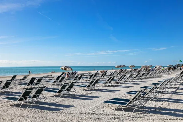 a view of a couch and an ocean view
