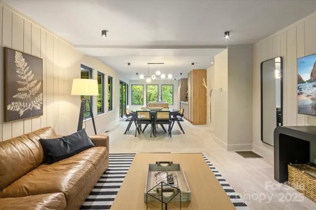 a view of a dining room with furniture window and outside view
