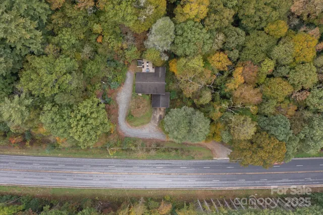 a view of a chairs and table on the deck