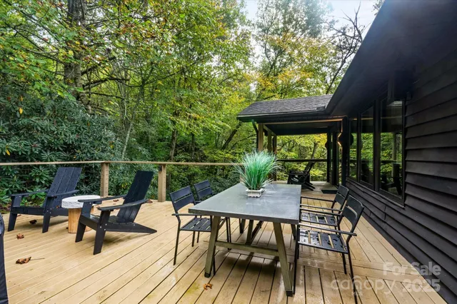 a kitchen with sink a stove and cabinets