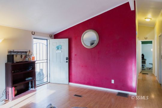 1140 North Calvert Boulevard Ridgecrest, CA 93555 - Photo 5 of 27 a view of a livingroom with wooden floor