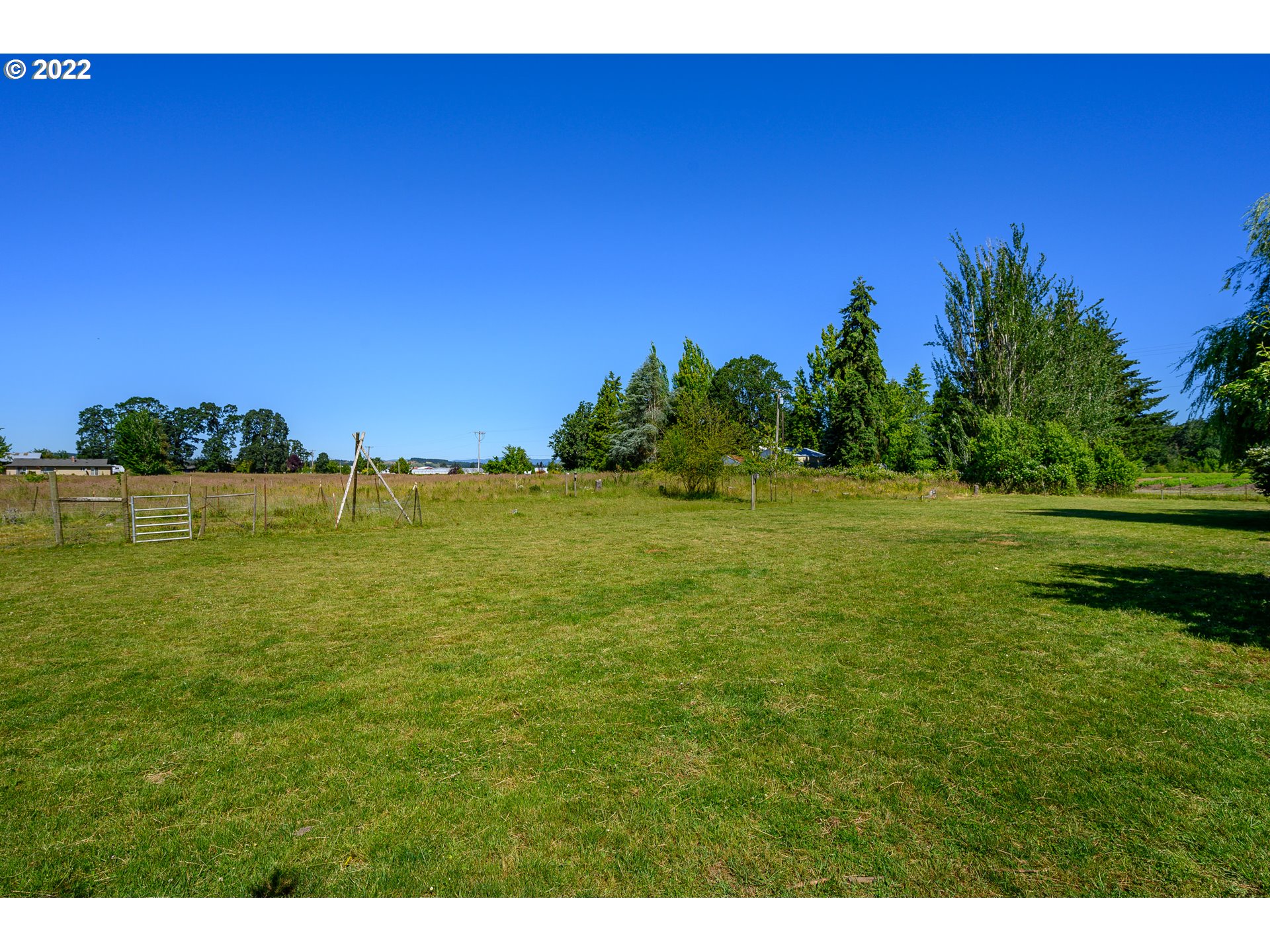 16041 Southeast Unionvale Road Dayton, OR 97114 - Photo 31 of 31 a view of a field with an trees