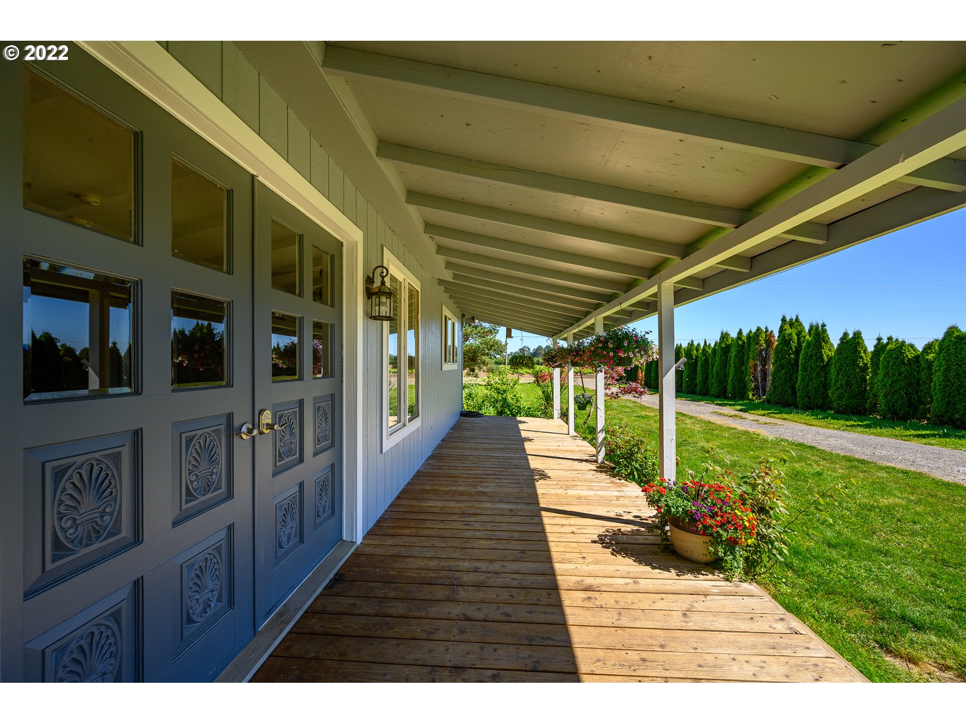 16041 Southeast Unionvale Road Dayton, OR 97114 - Photo 5 of 31 a view of a patio with a table and chairs