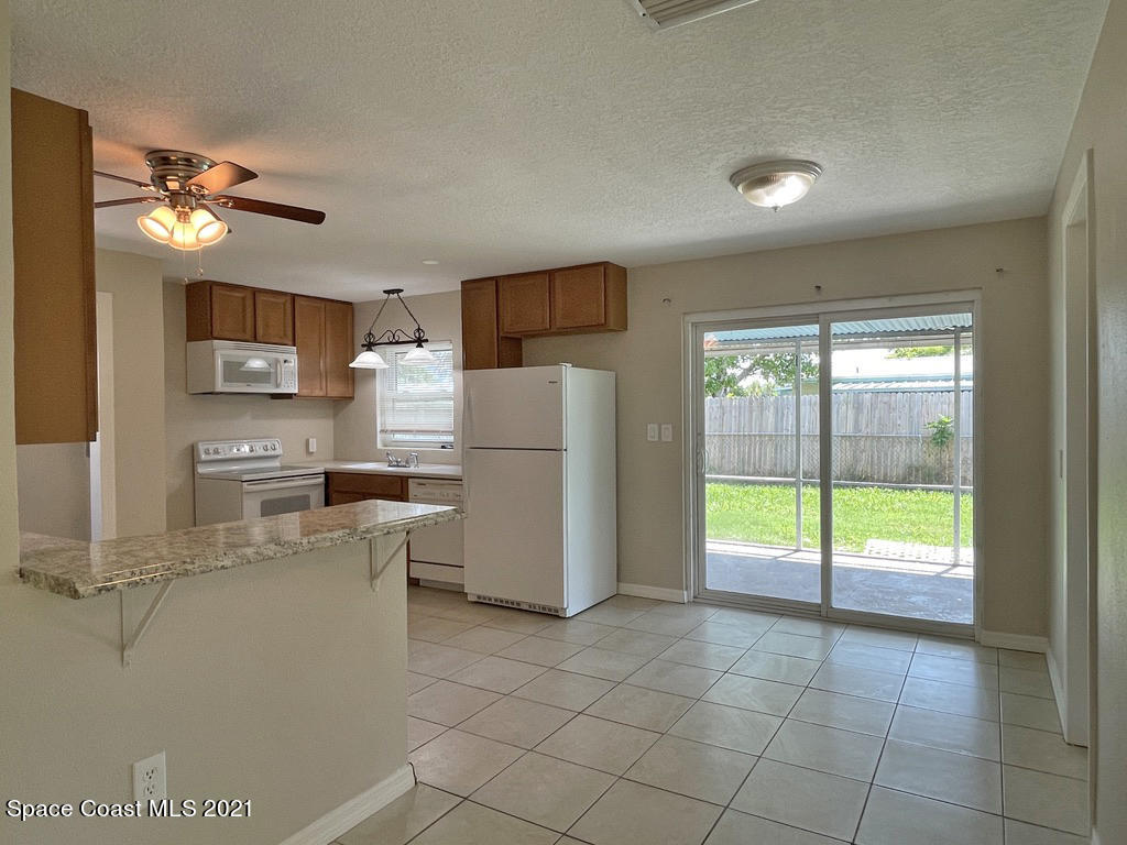 304 3rd Street Merritt Island, FL 32953 - Photo 5 of 20 Kitchen Dining Room