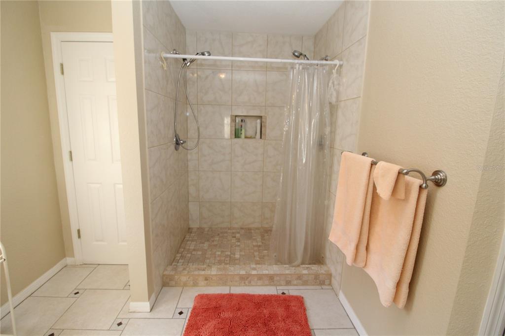 7432 Perennial Road North Port, FL 34291 - Photo 35 of 61 a bathroom with a shower
