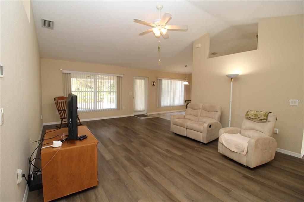 7432 Perennial Road North Port, FL 34291 - Photo 49 of 61 a living room with furniture and a window