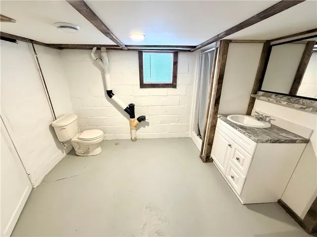 a view of a kitchen with cabinets