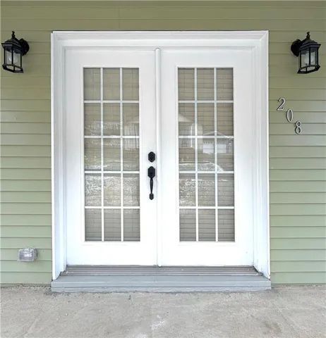 a balcony view with a wooden floor
