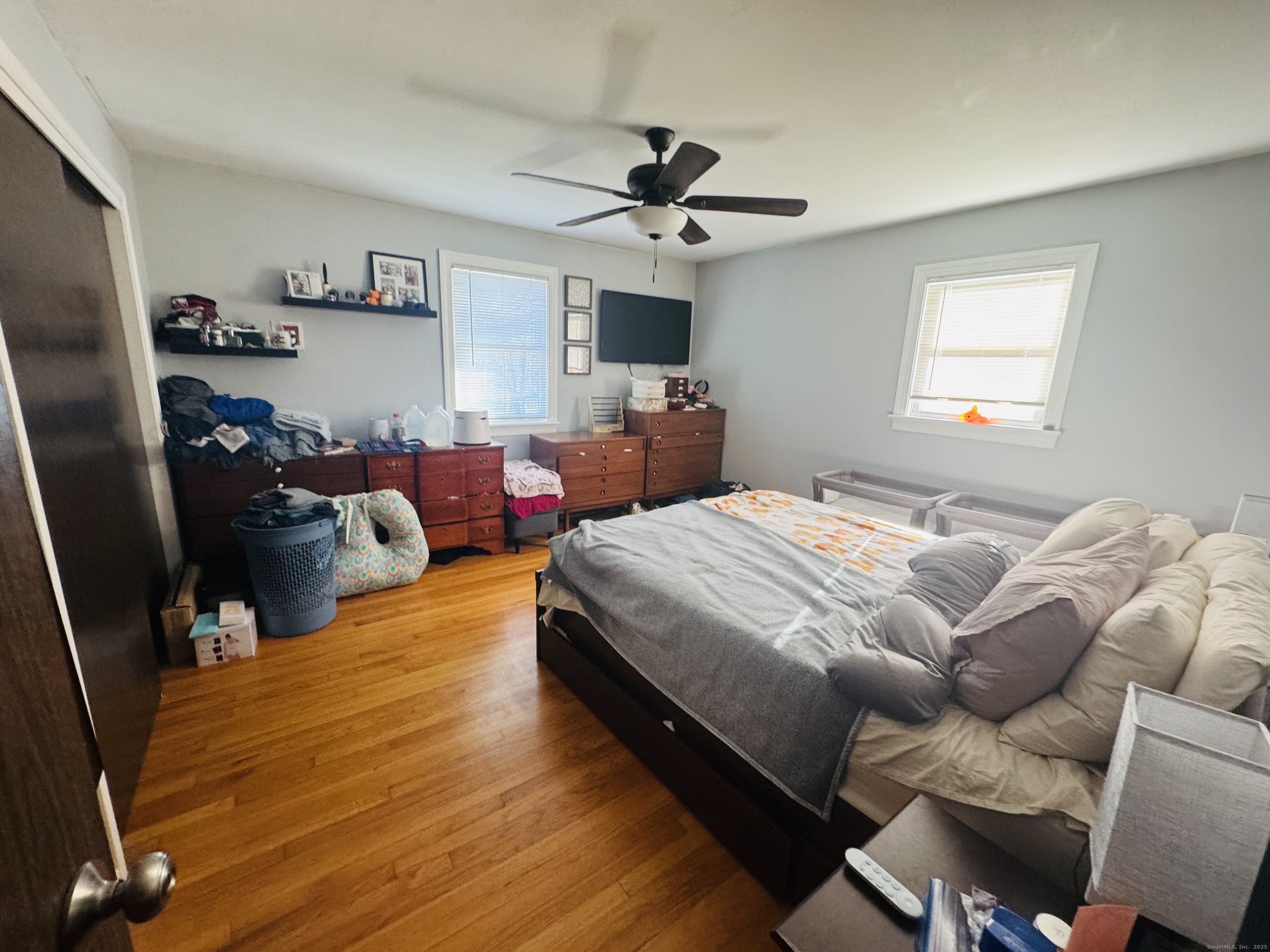 205 Ballamahack Road Windham, CT 06280 - Photo 11 of 29 a bedroom with a bed and a flat screen tv