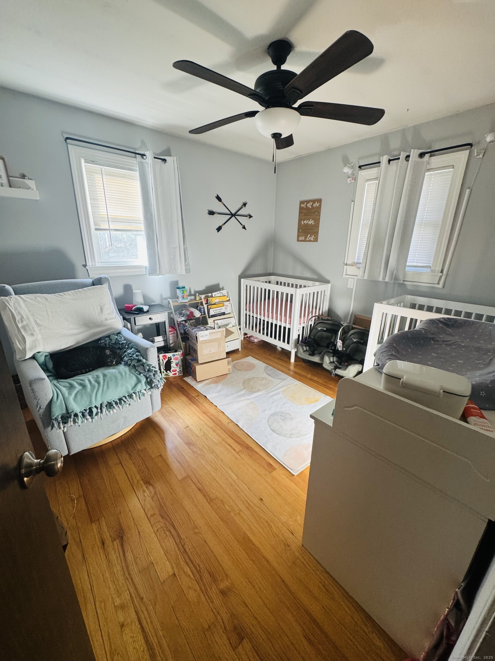 205 Ballamahack Road Windham, CT 06280 - Photo 12 of 29 a living room with furniture and a wooden floor