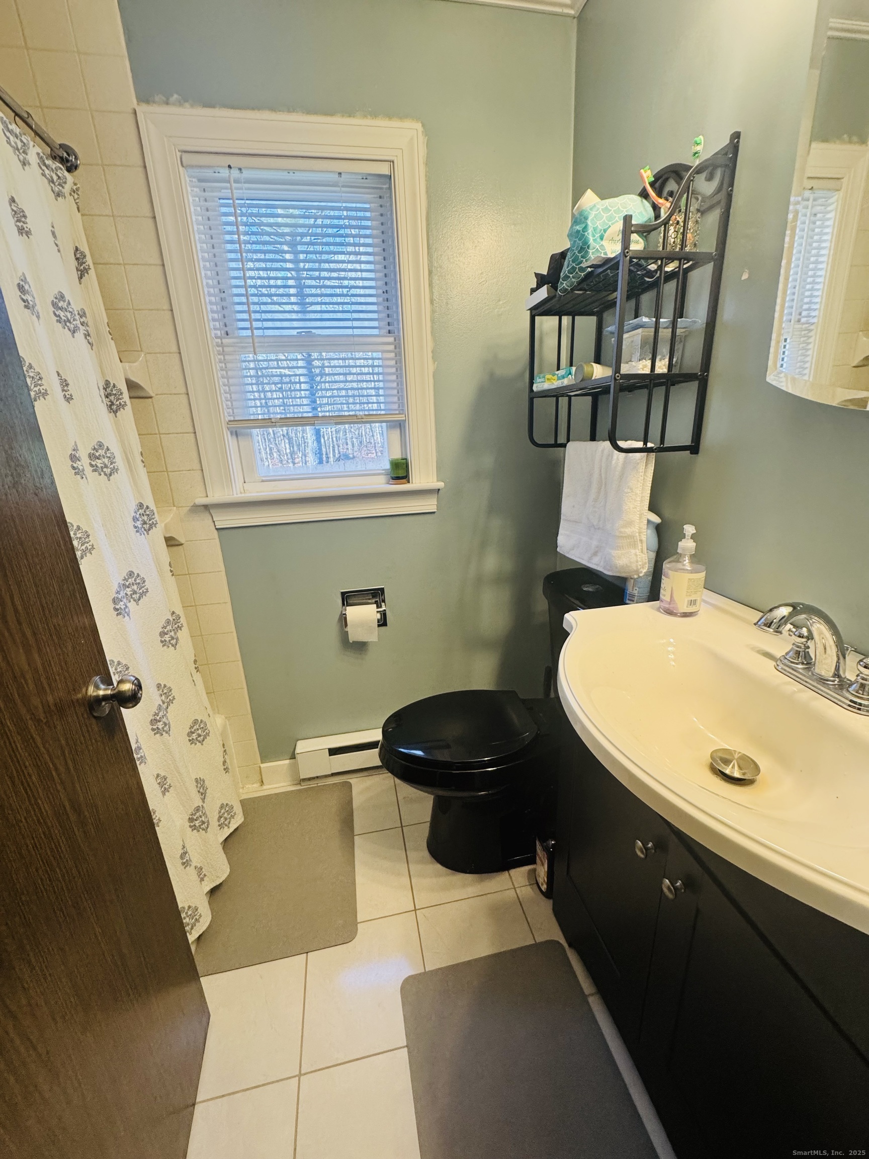 205 Ballamahack Road Windham, CT 06280 - Photo 13 of 29 a bathroom with a sink and a mirror