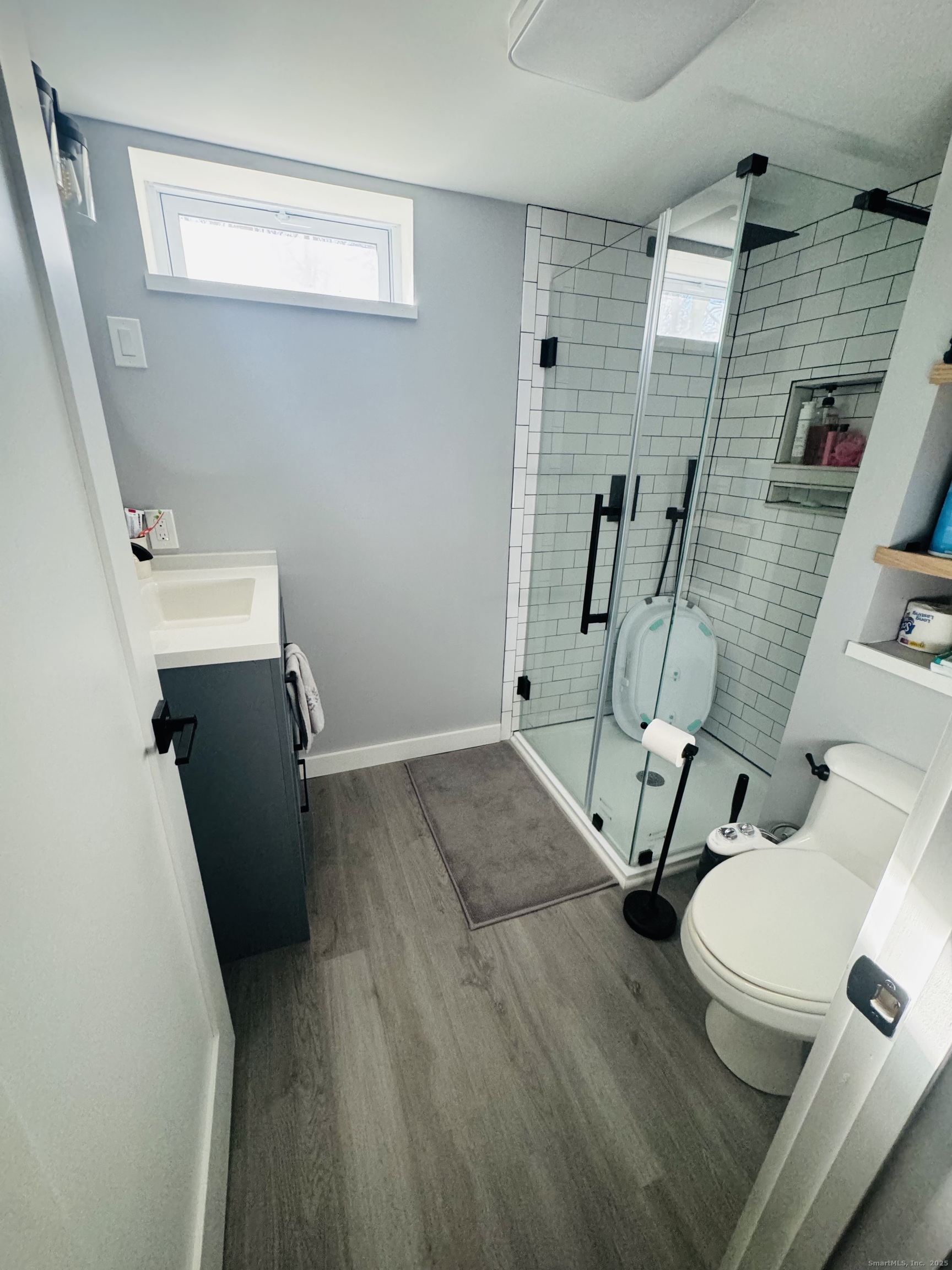 205 Ballamahack Road Windham, CT 06280 - Photo 15 of 29 view of a room with wooden floor and windows