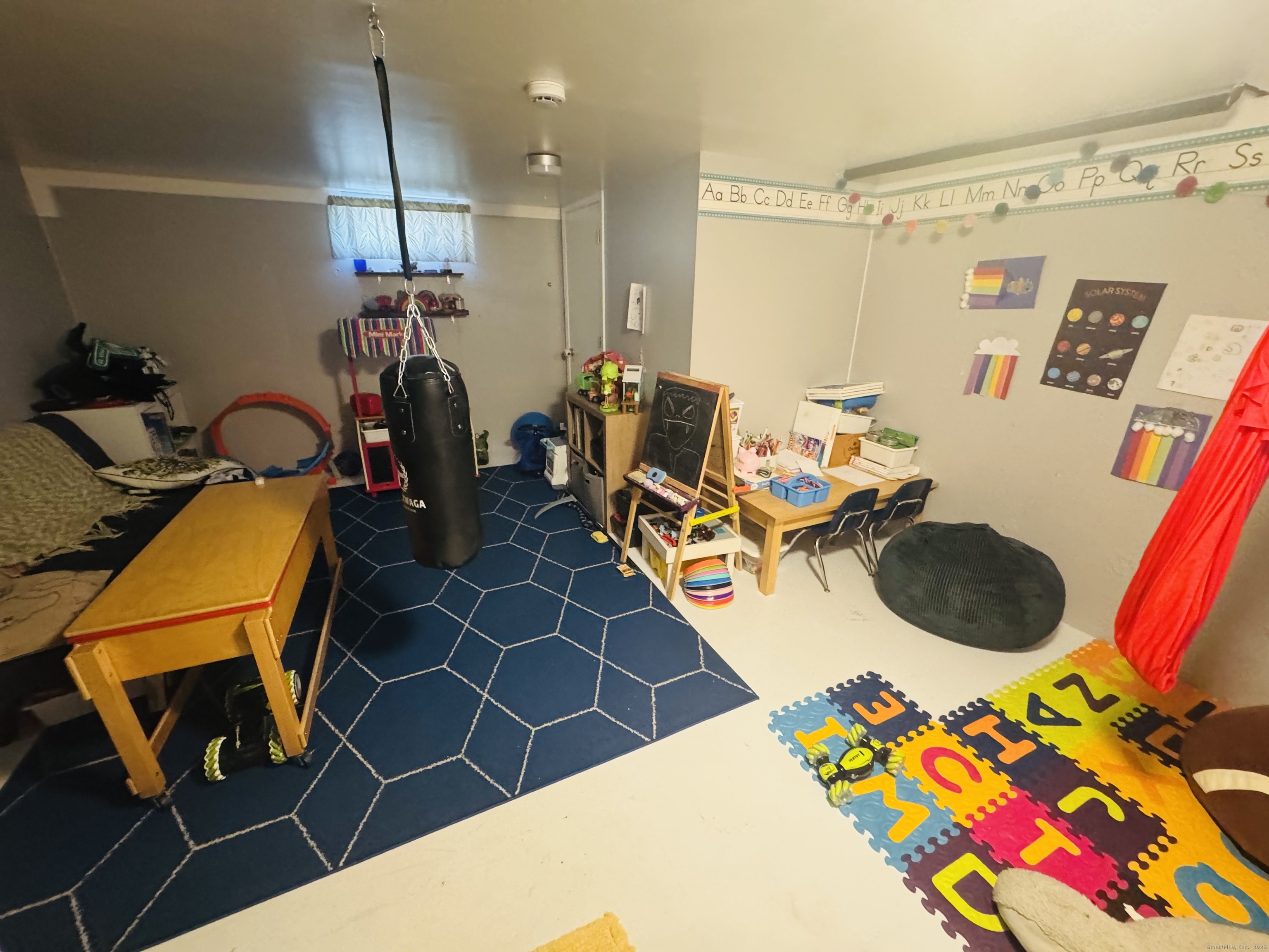 205 Ballamahack Road Windham, CT 06280 - Photo 24 of 29 a room with gym equipment and wooden floor