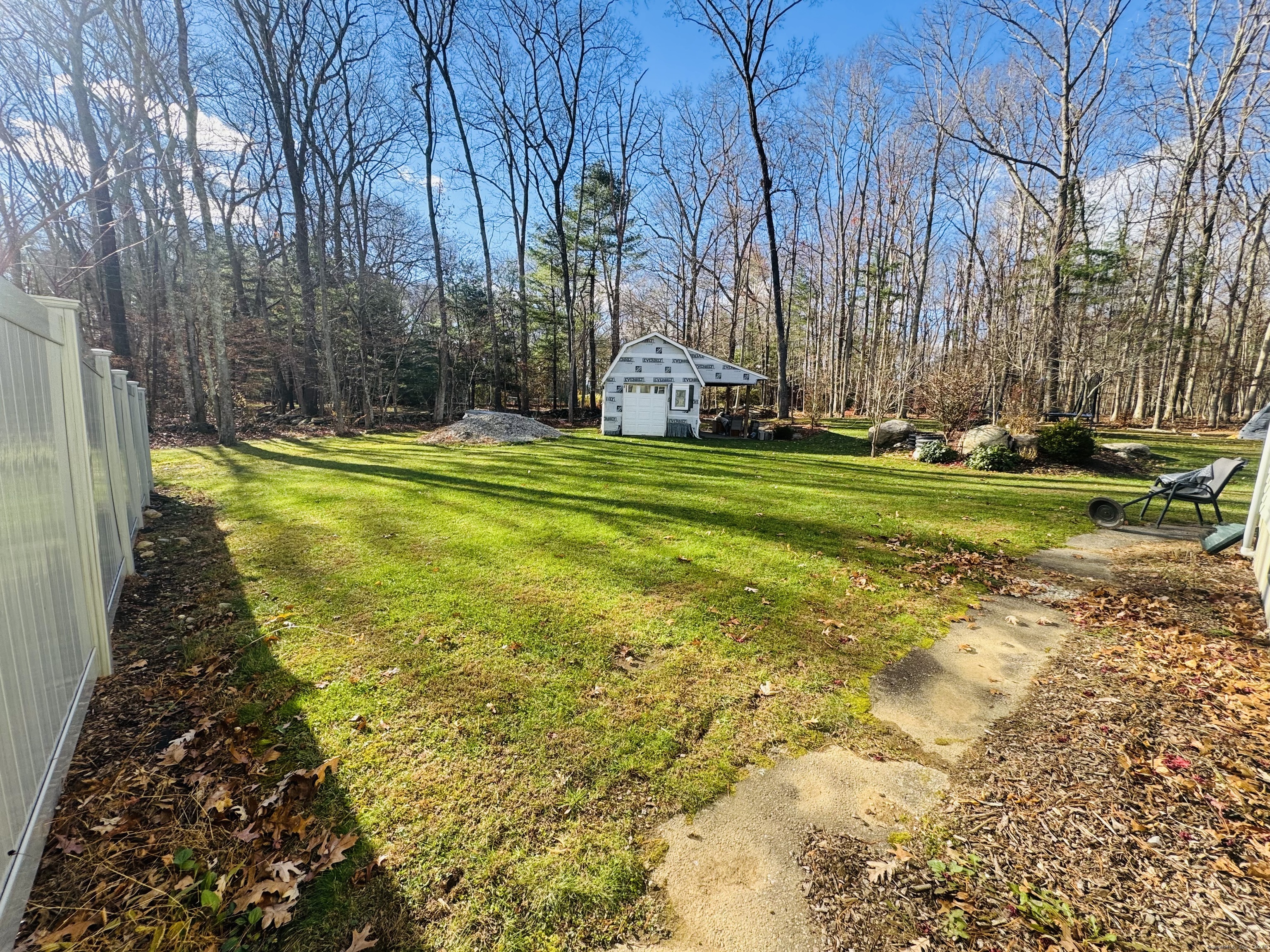 205 Ballamahack Road Windham, CT 06280 - Photo 3 of 29 a view of a backyard with large trees