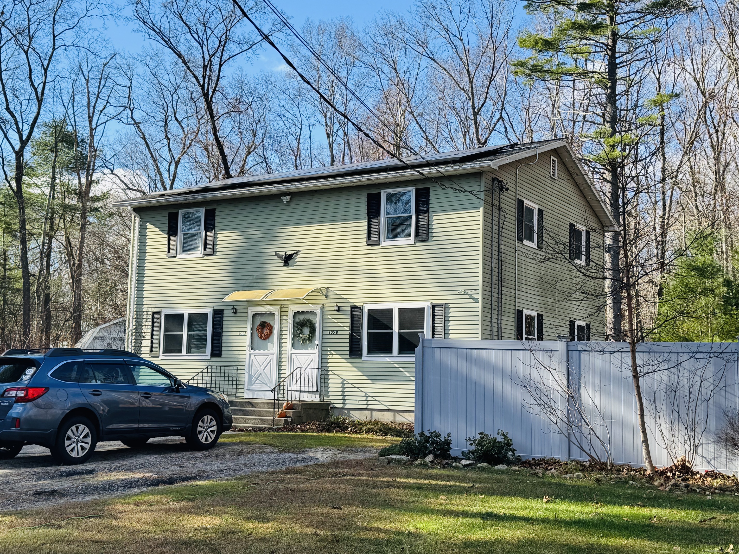205 Ballamahack Road Windham, CT 06280 - Photo 7 of 29 a front view of a house with a garden and yard