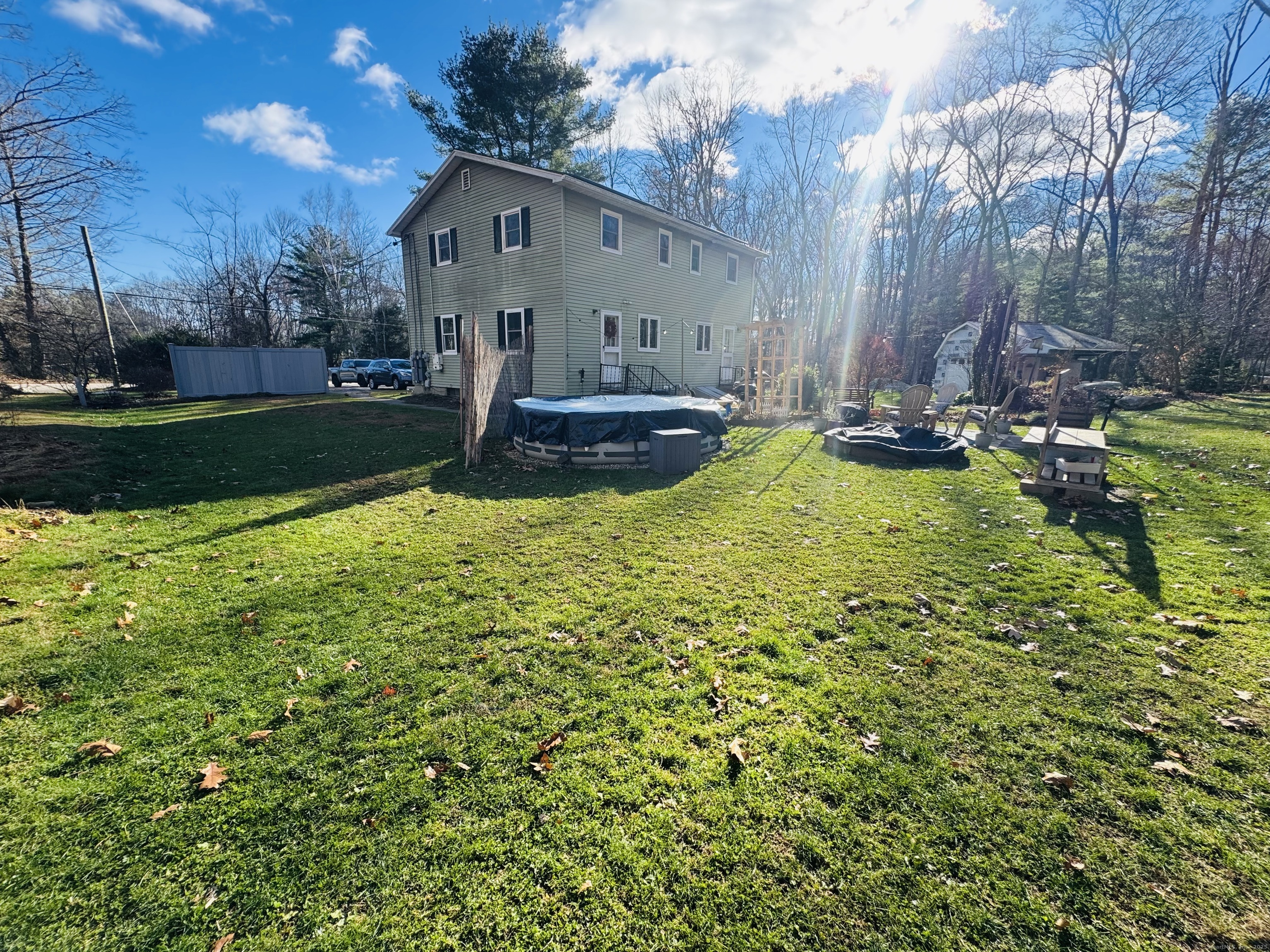 205 Ballamahack Road Windham, CT 06280 - Photo 8 of 29 a view of backyard with swimming pool and green space